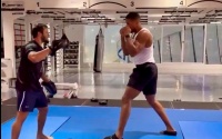 Anthony Joshua shares clip of him back in the gym hitting the pads boxrec fight time date tv channel undercard sina latz opponent ben davison trainer coach