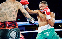 Bruno Tarimo vs Paul Fleming WBA and IBF title fight halted early on a technical decision