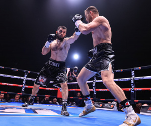 Artur Beterbiev records stoppage victory over Adam Deines to retain unified light heavyweight titles