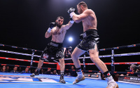 Artur Beterbiev records stoppage victory over Adam Deines to retain unified light heavyweight titles