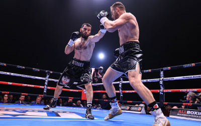 Artur Beterbiev records stoppage victory over Adam Deines to retain unified light heavyweight titles