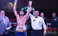 Mike Gavronski defeats Tommy Hughes