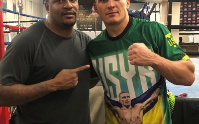 Jake Paul coach Rydell Booker predicts winner of Tyson Fury vs Oleksandr Usyk prediction boxrec wiki wbc youth heavyweight campion no.1 amateur america
